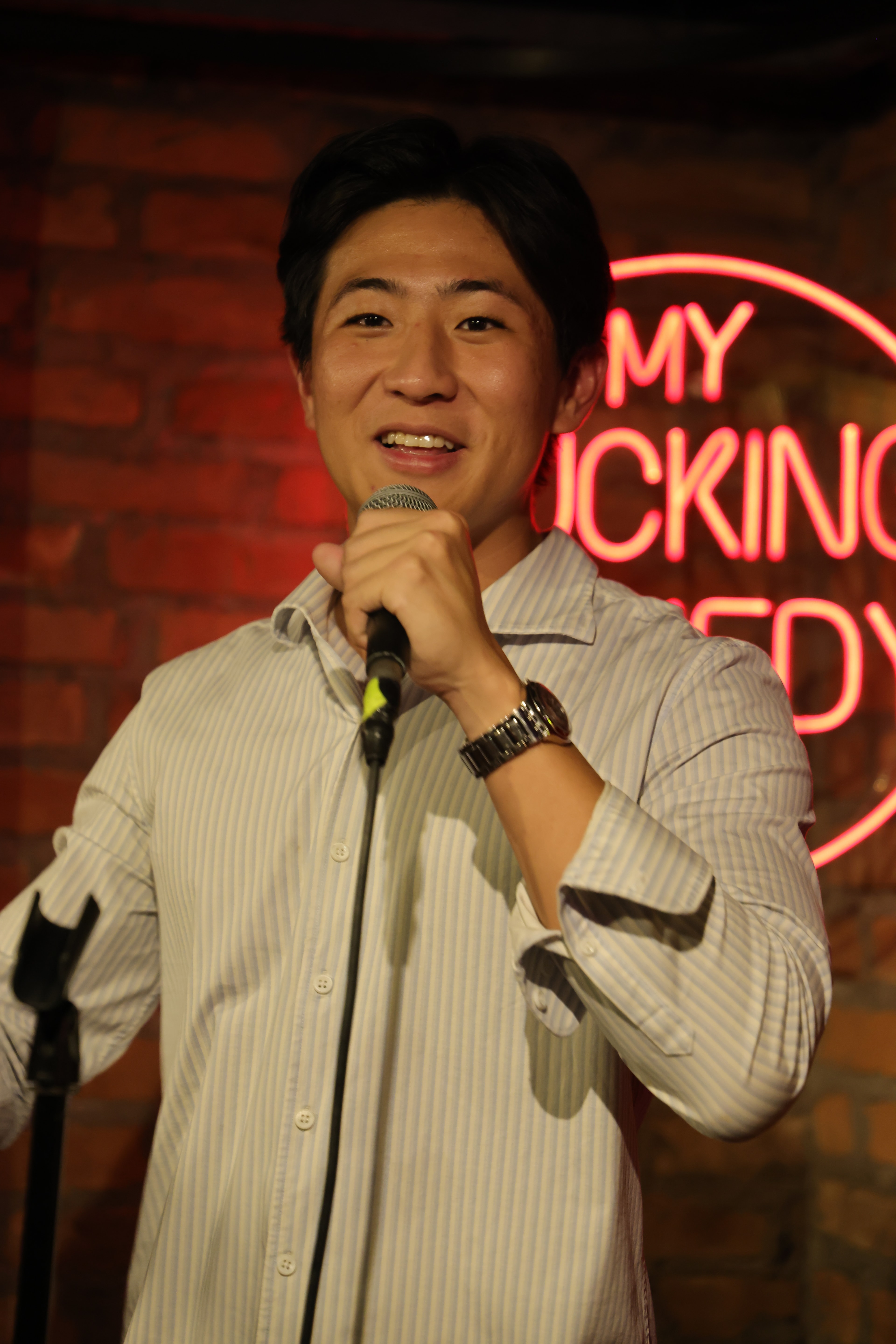 Edmund Zheng performing live stage hypnosis